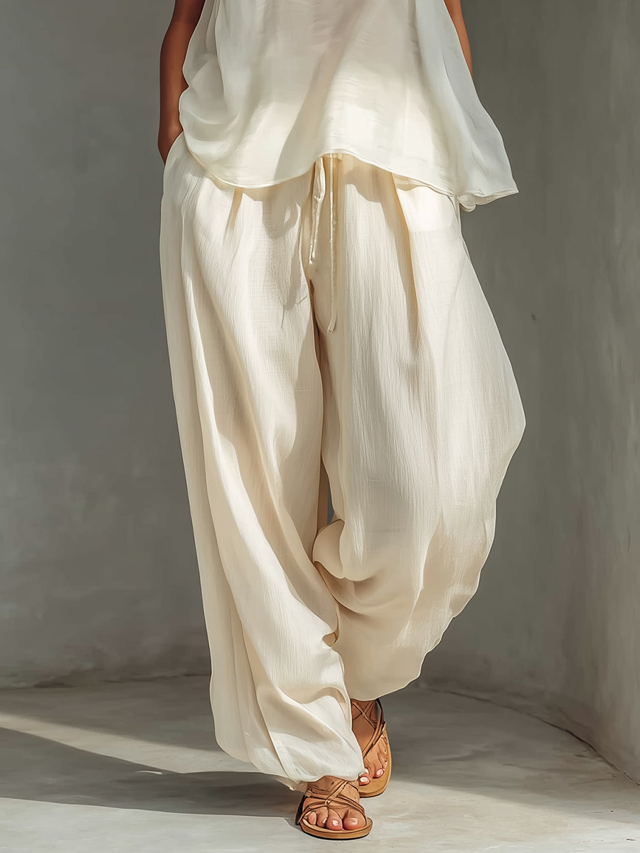 Pantalón ancho crema de tencel con cordón