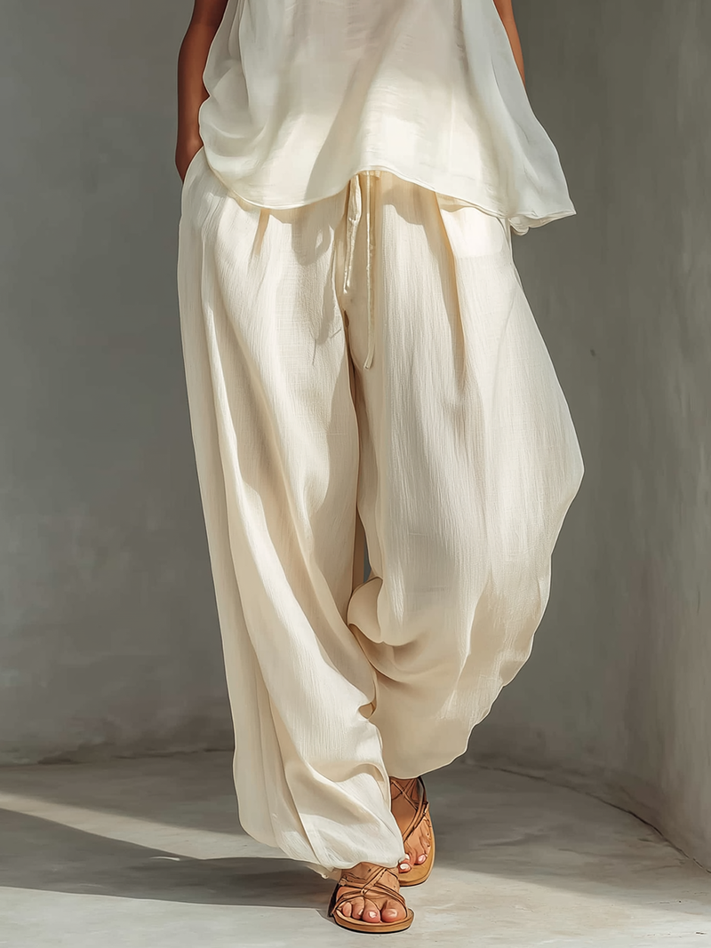 Pantalón ancho crema de tencel con cordón