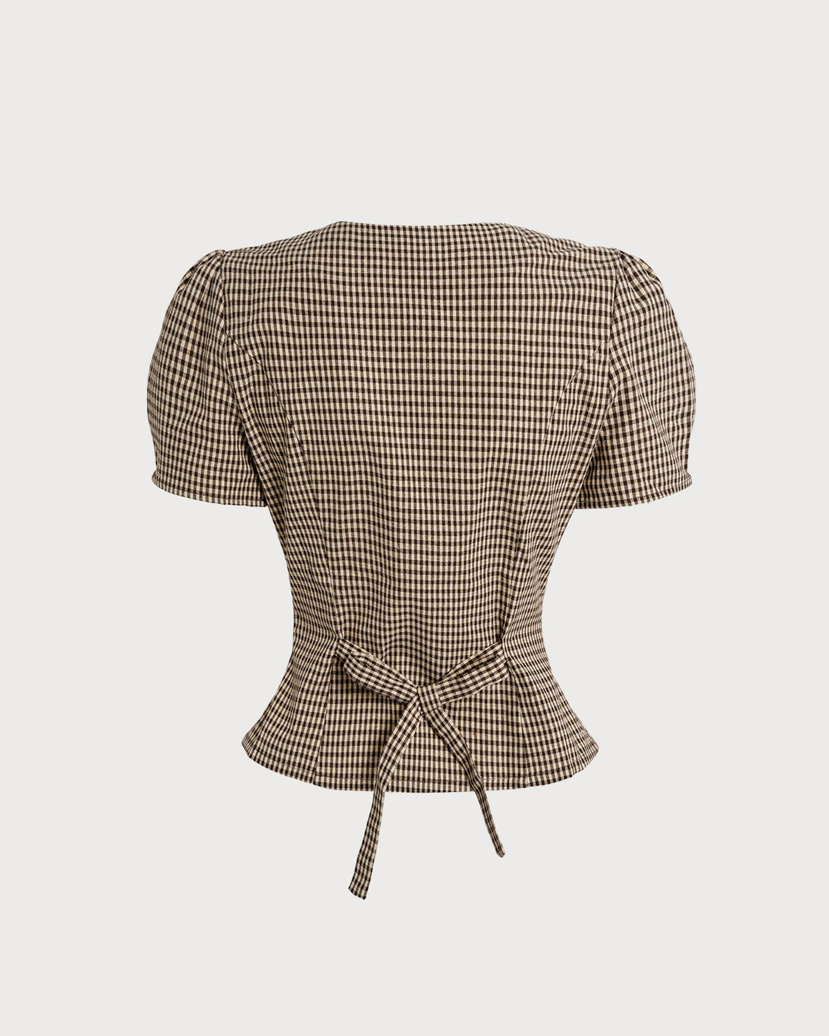 Blusa de cuadros marrones con mangas abullonadas