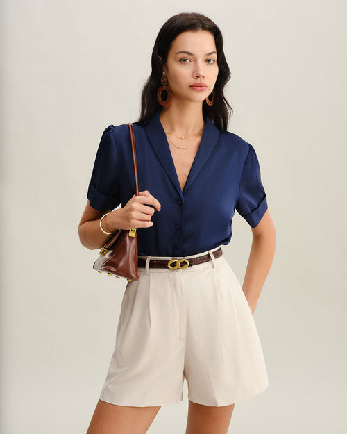 Blusa de satén azul marino con botones