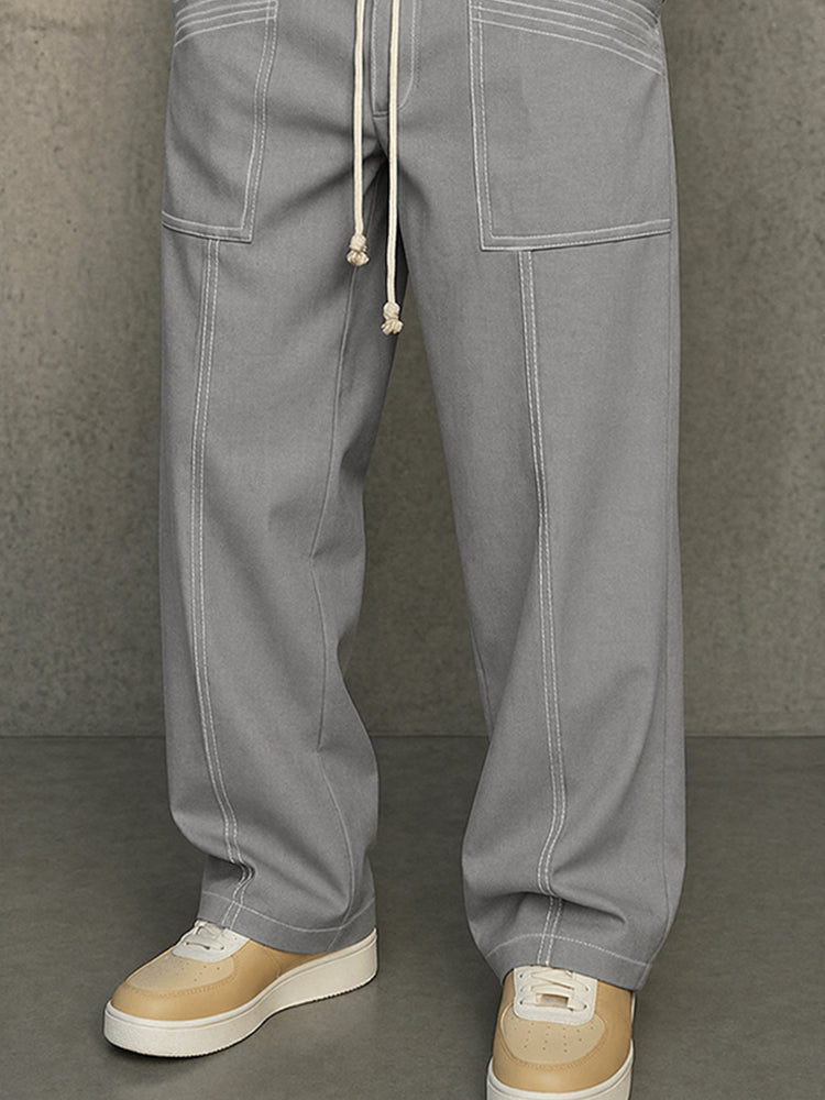 Pantalón urbano con costuras contraste