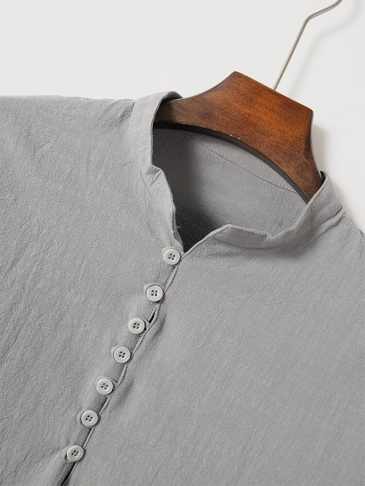 Camisa casual de algodón y lino con cierre de medio botón
