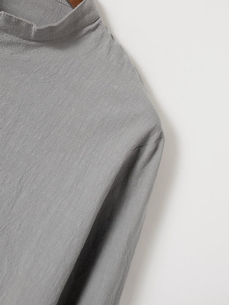 Camisa casual de algodón y lino con cierre de medio botón