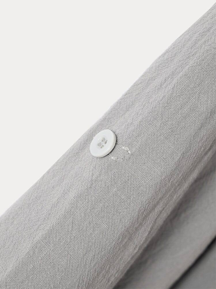 Camisa casual de algodón y lino con cierre de medio botón