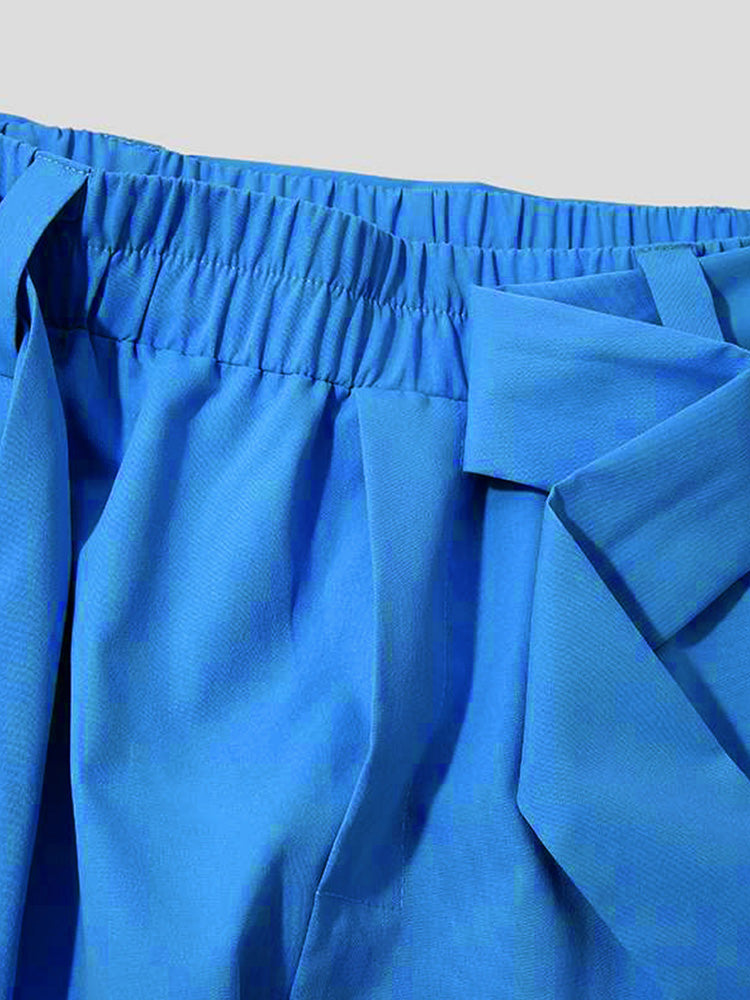 Pantalón harem cropped plisado con cinturón