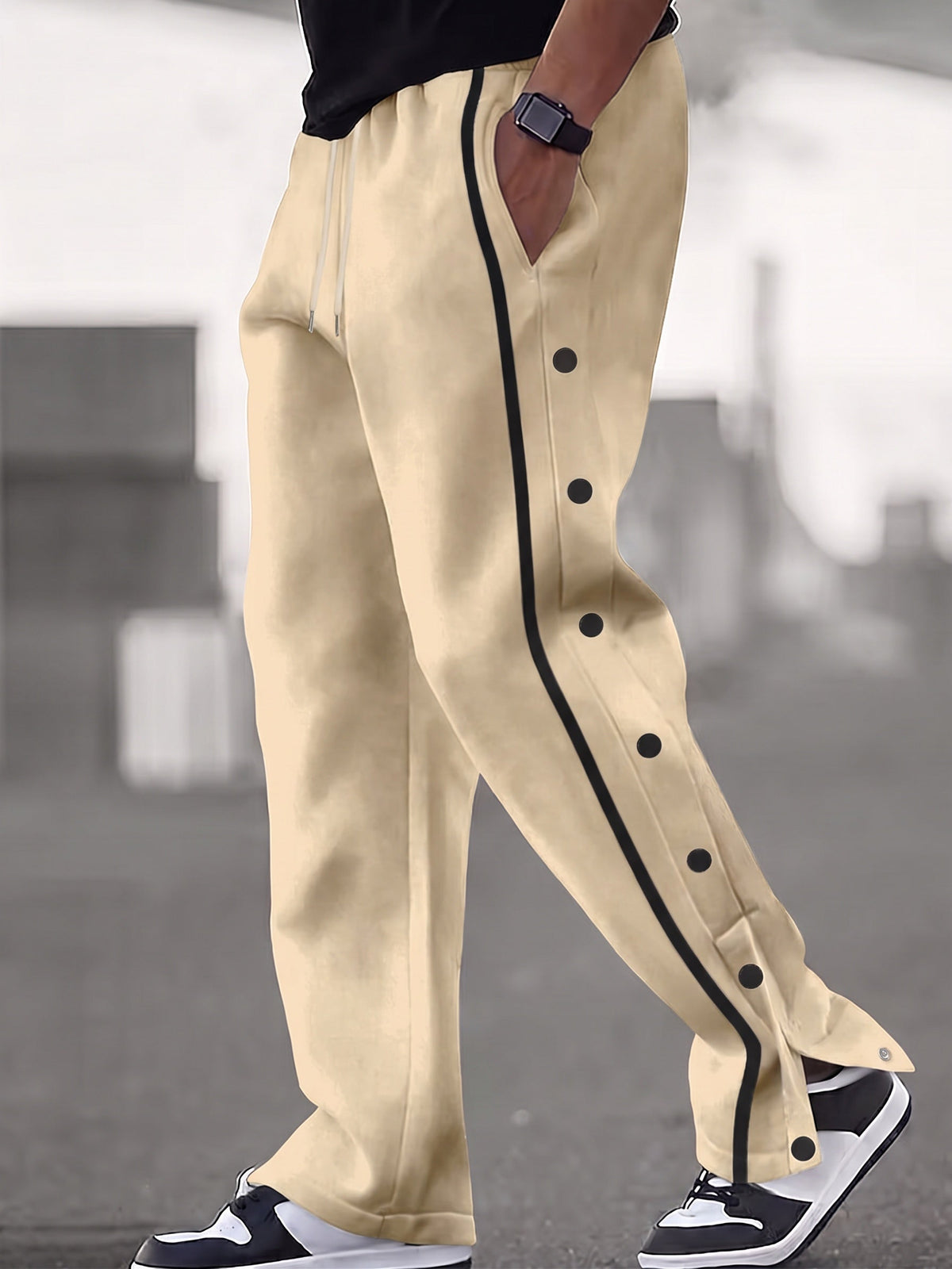 Pantalón deportivo ancho retro con botones a presión