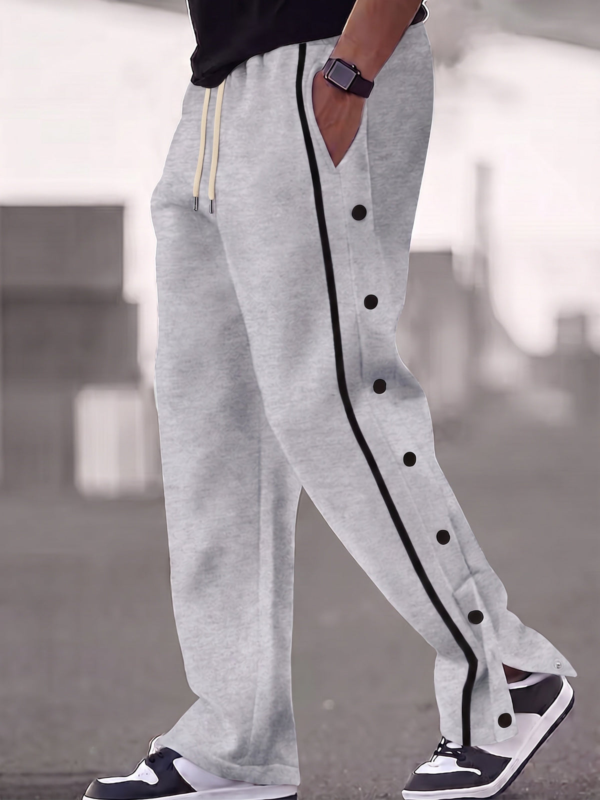 Pantalón deportivo ancho retro con botones a presión