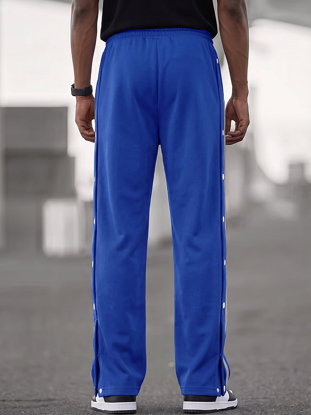 Pantalón deportivo ancho retro con botones a presión