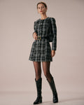 Vestido corto negro a cuadros con cuello redondo y silueta en A
