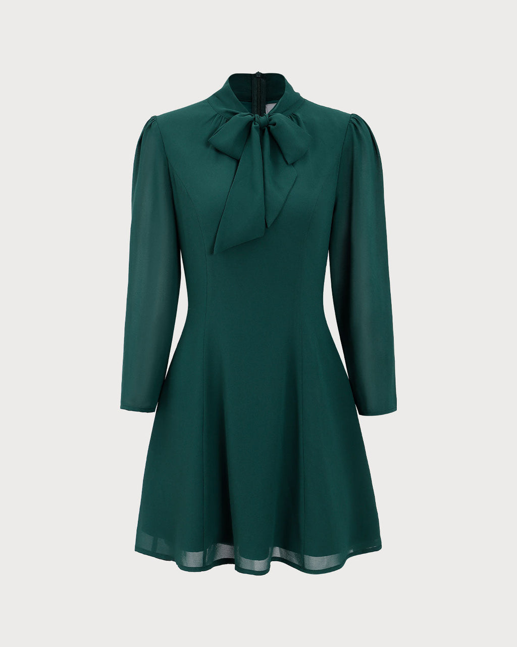 Vestido corto verde con cuello de lazo y tela transparente
