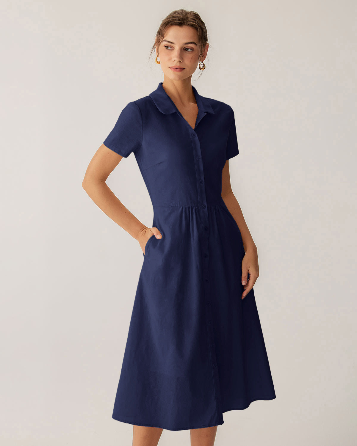 Vestido midi azul marino de manga corta con bolsillos