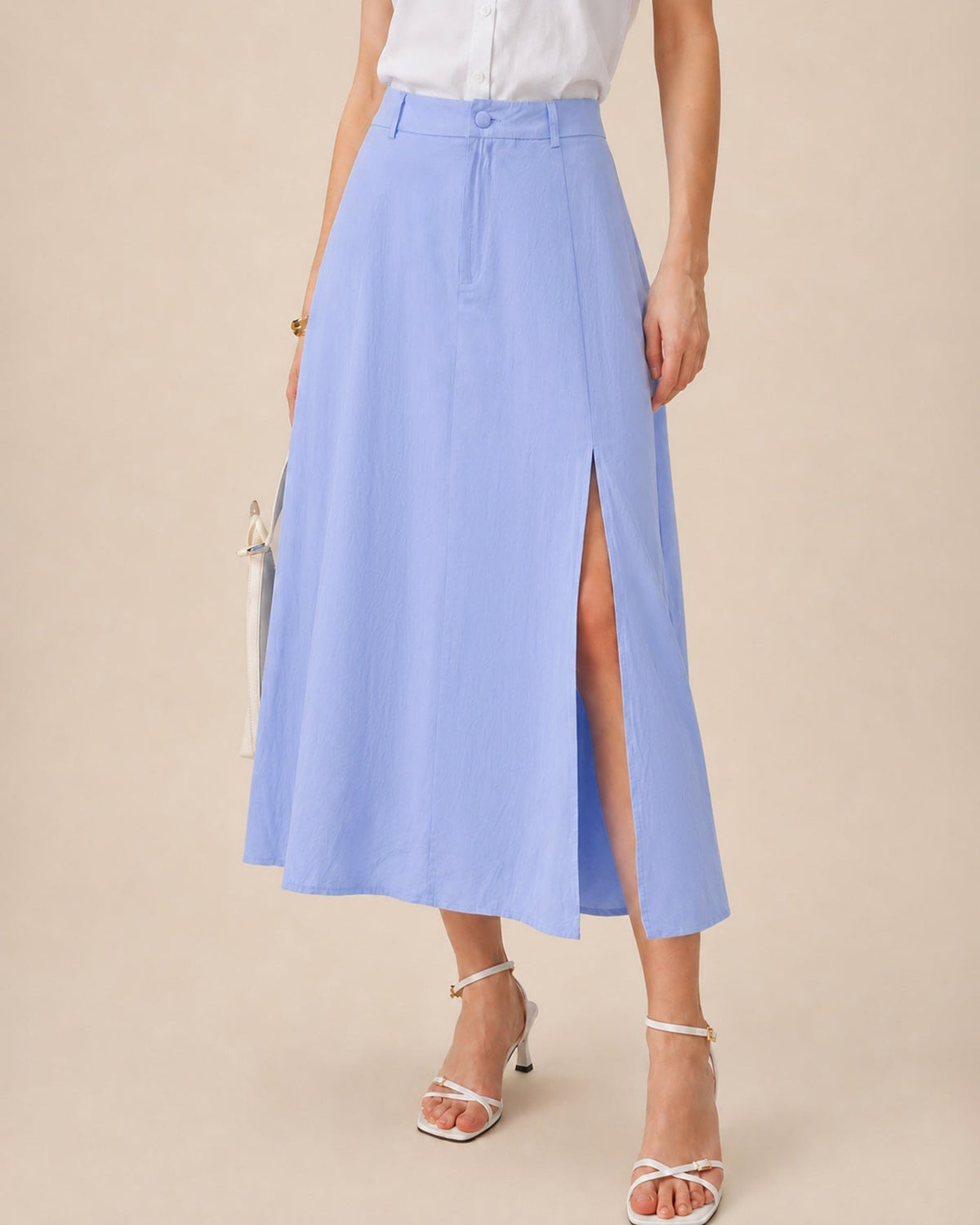 Falda midi de línea A azul con botones y abertura