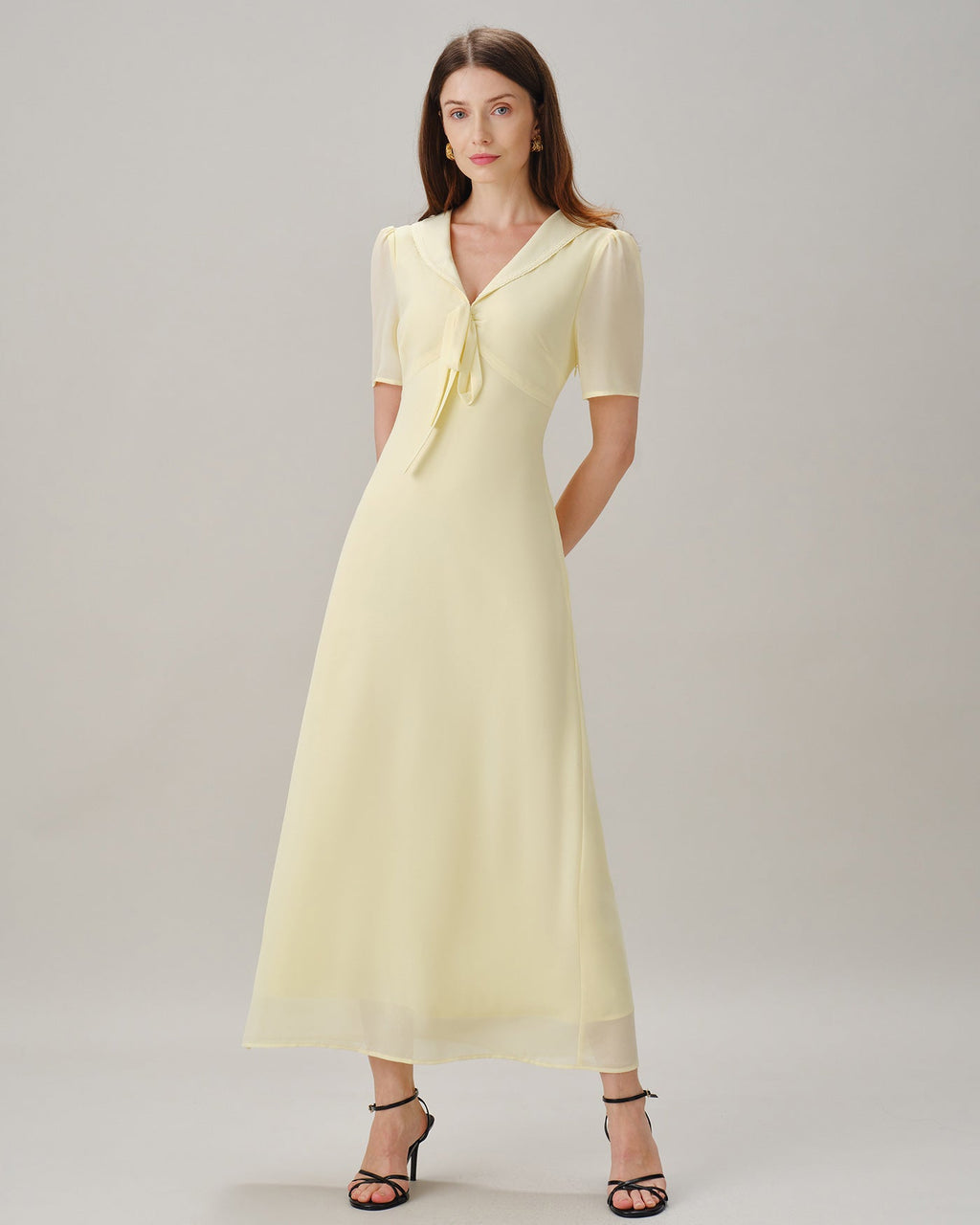 Vestido maxi de túnica amarillo con escote en V y lazo