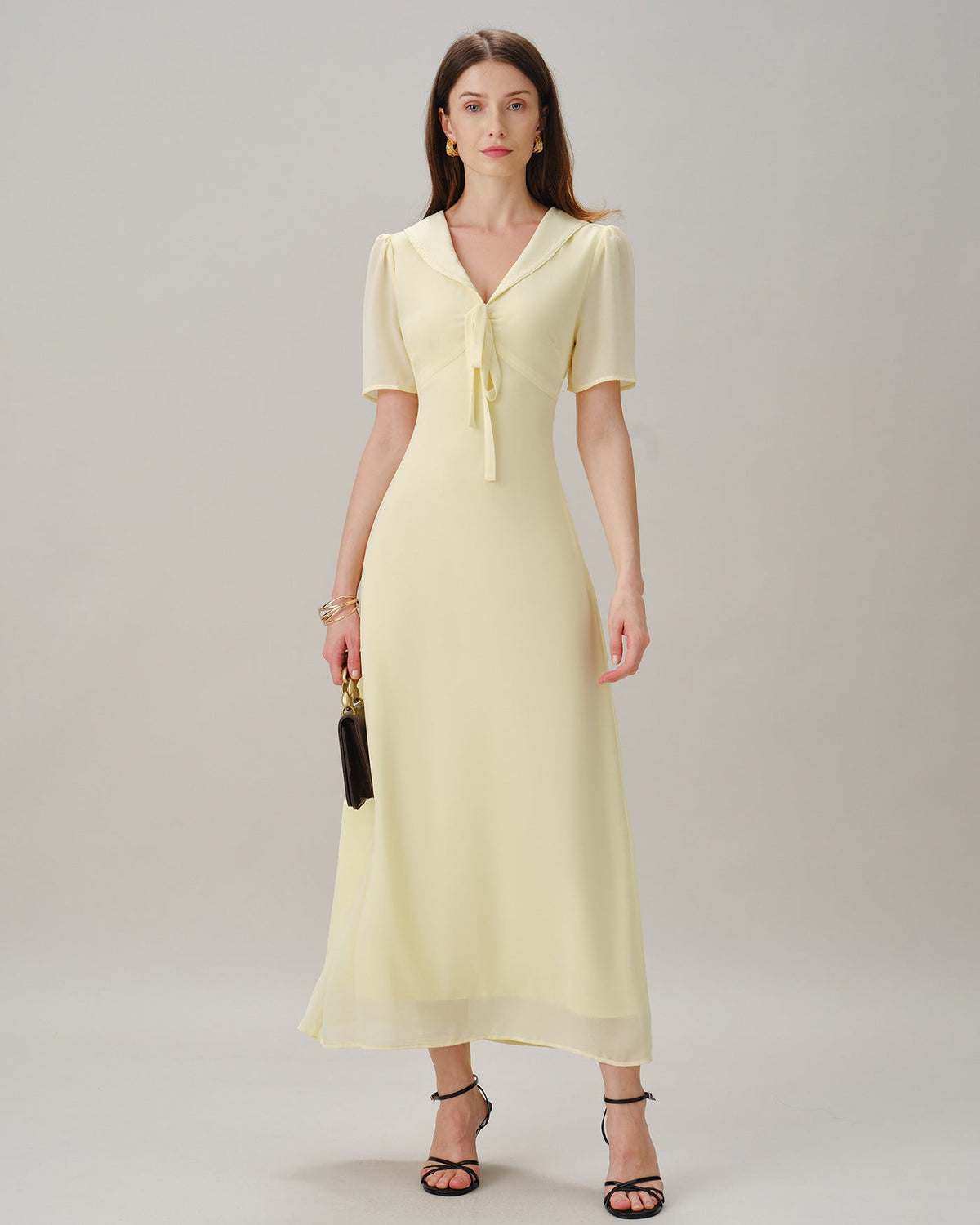 Vestido maxi de túnica amarillo con escote en V y lazo