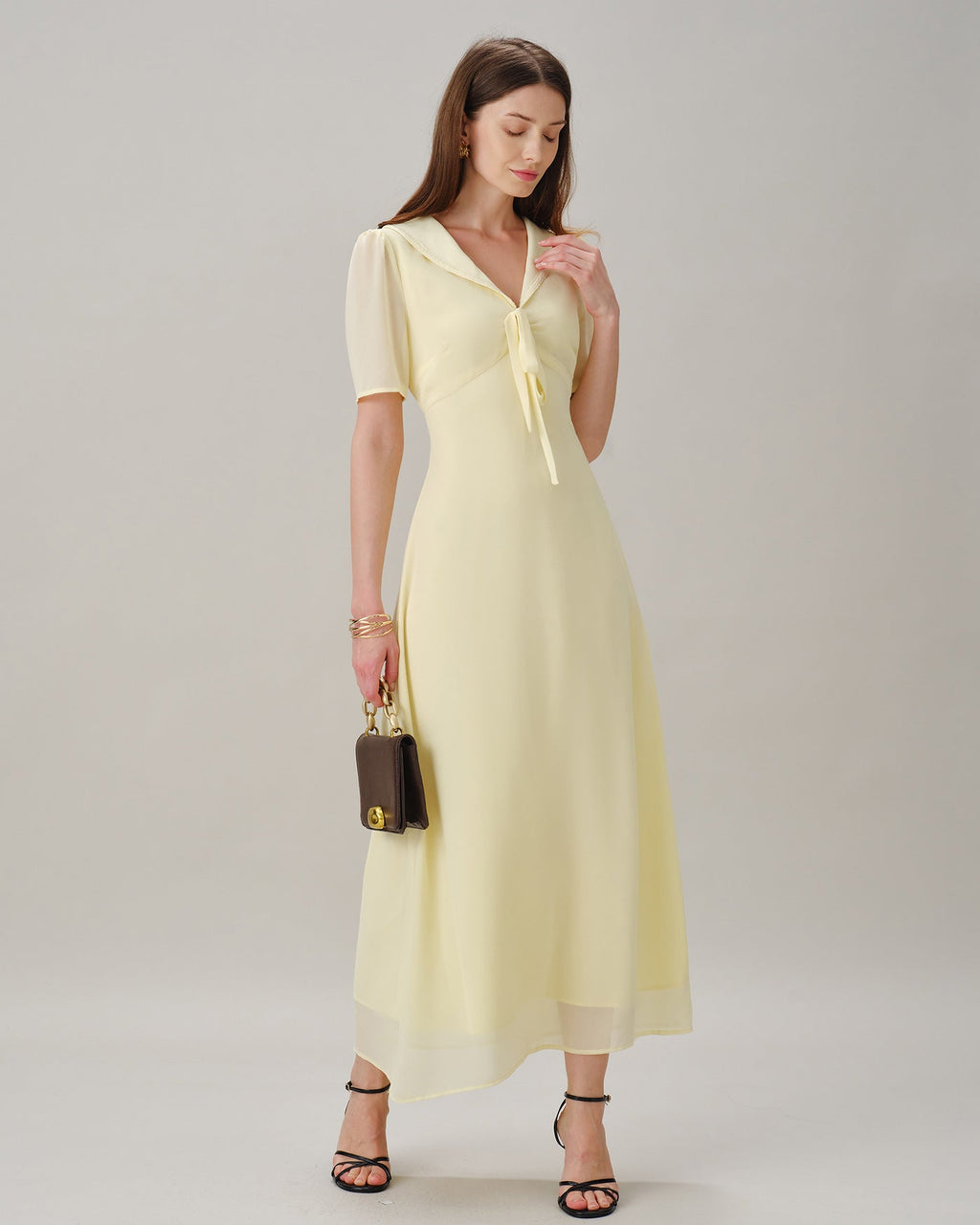 Vestido maxi de túnica amarillo con escote en V y lazo