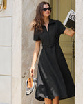 Vestido midi negro con cinturón de silueta en A