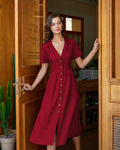 Vestido midi rojo de línea A con pliegues y botones