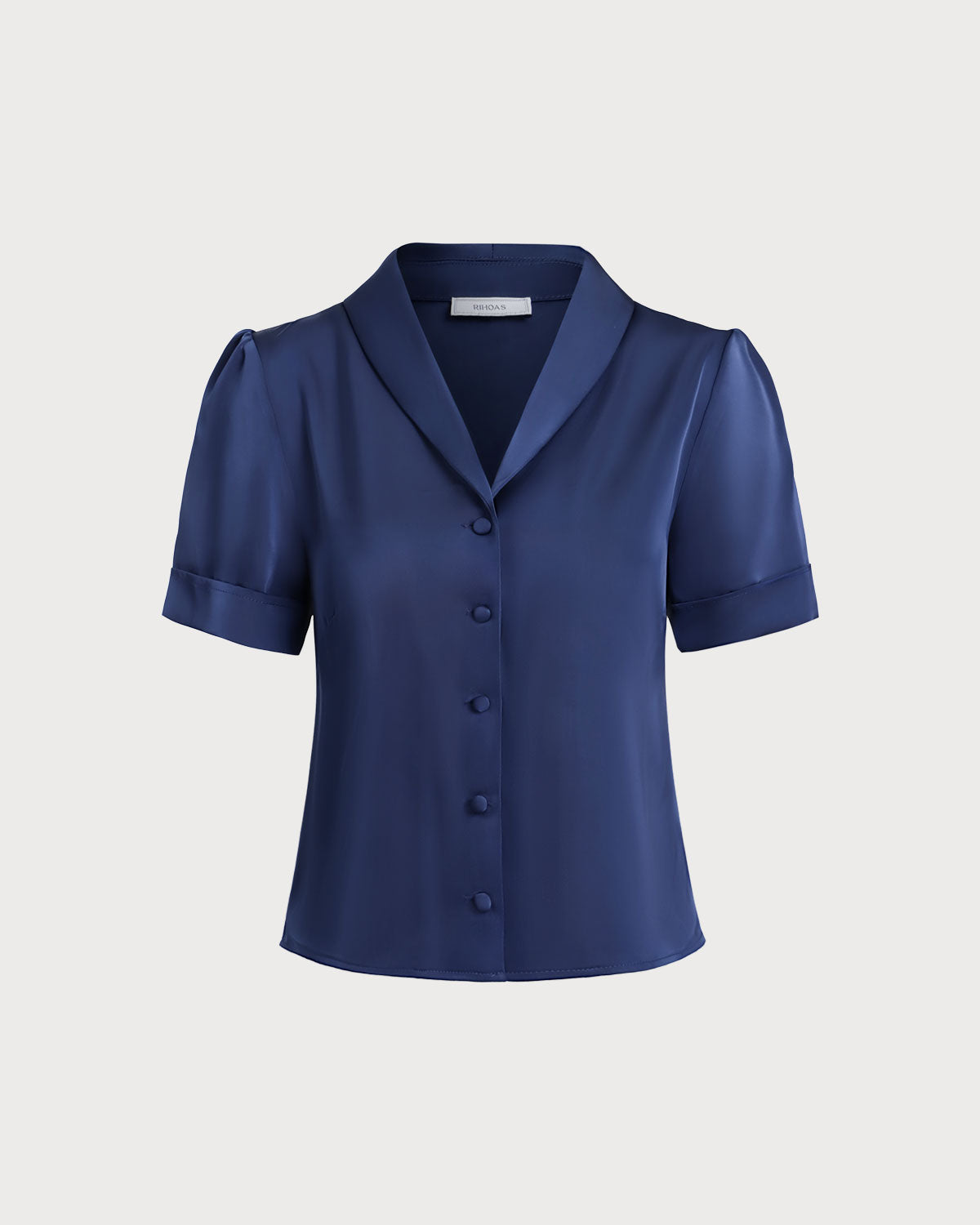 Blusa de satén azul marino con botones