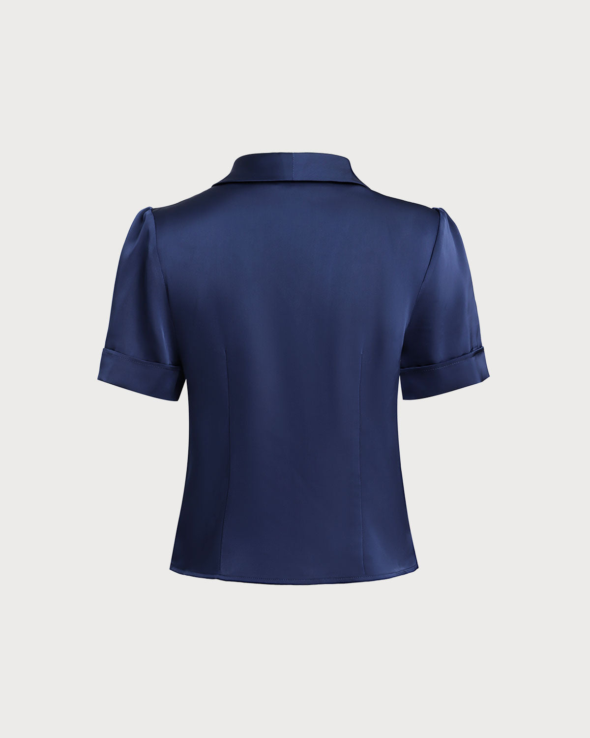 Blusa de satén azul marino con botones