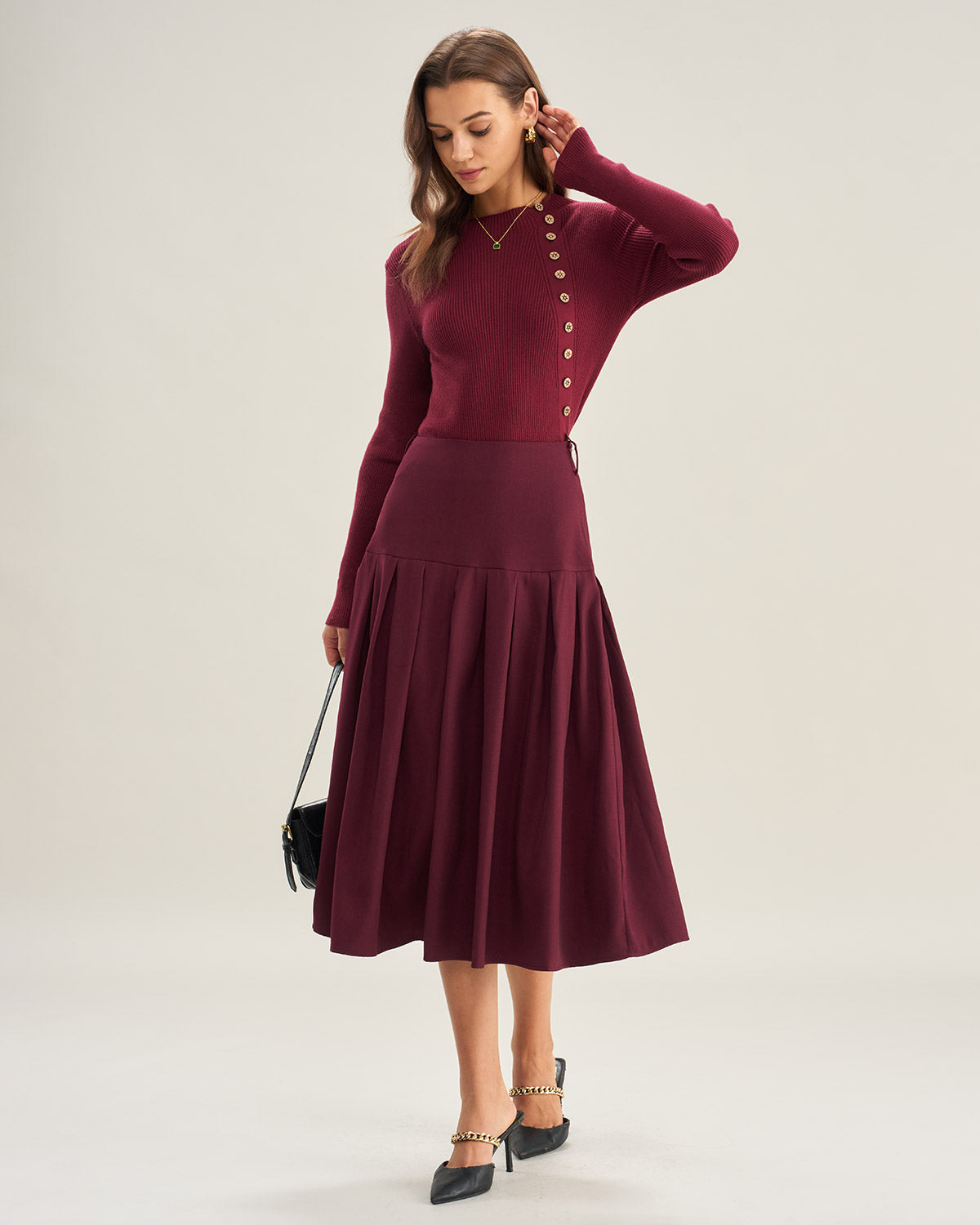 Falda midi plisada de cintura natural en color rojo vino