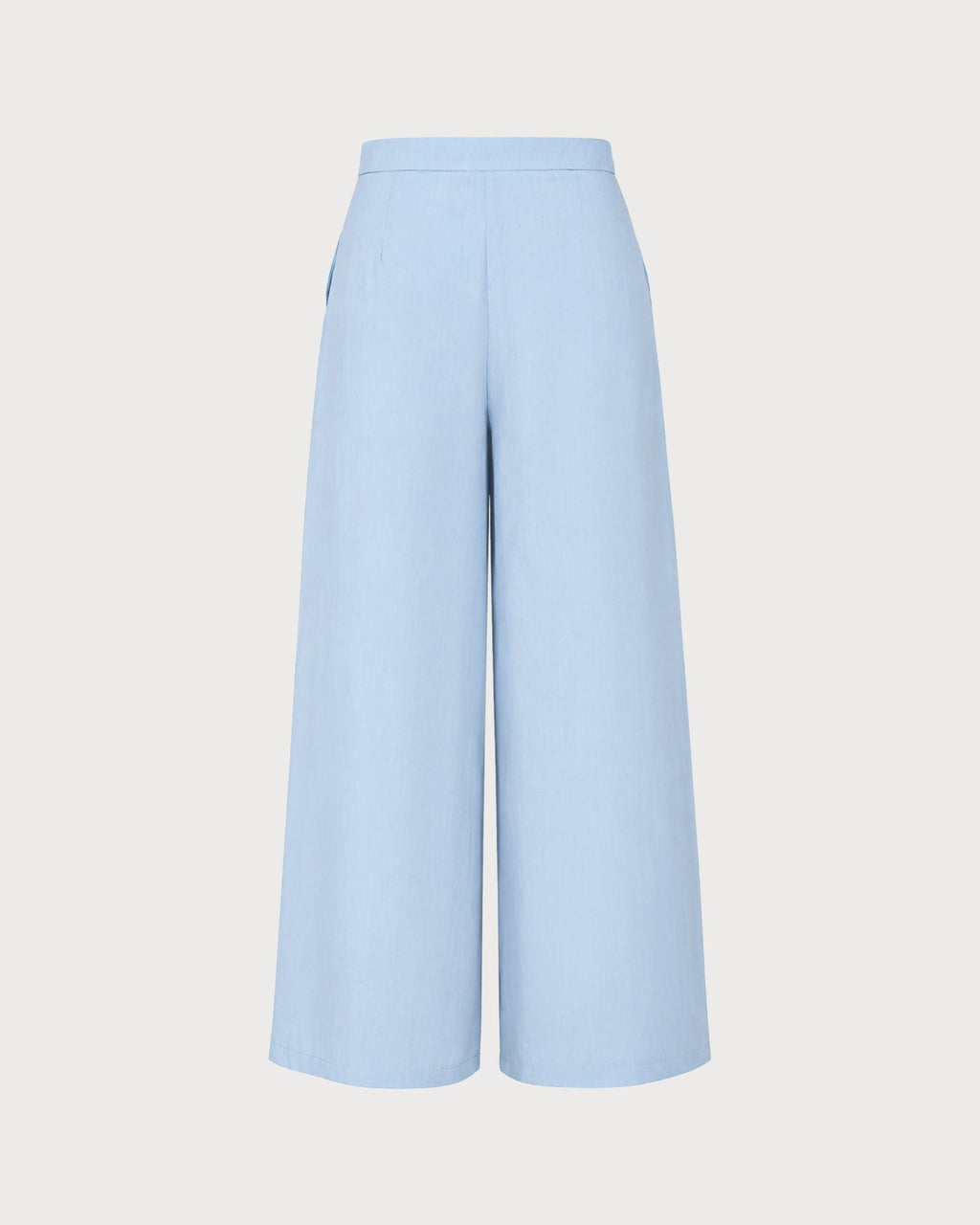 Pantalones rectos de color azul sólido con bolsillos