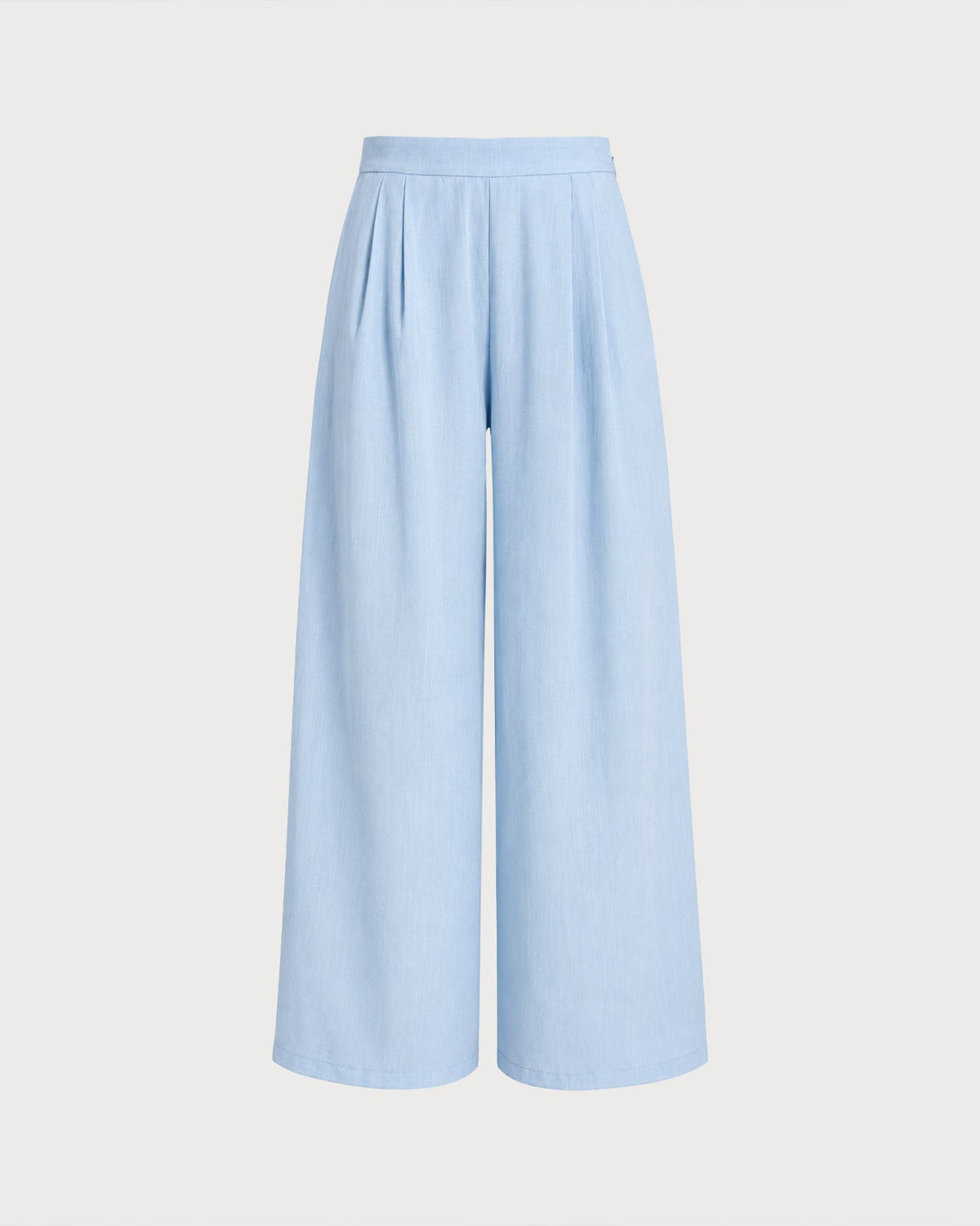 Pantalones rectos de color azul sólido con bolsillos
