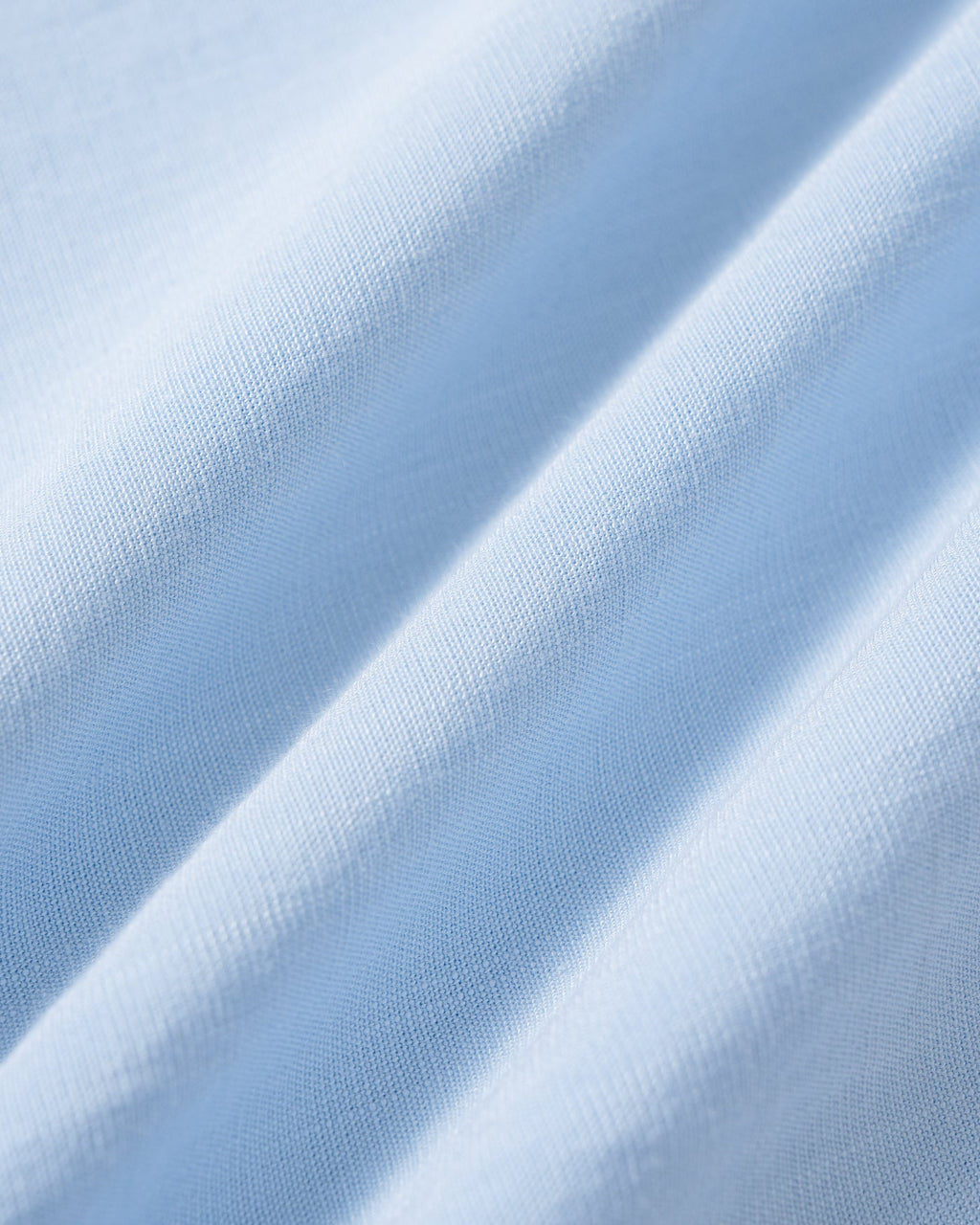 Pantalones rectos de color azul sólido con bolsillos