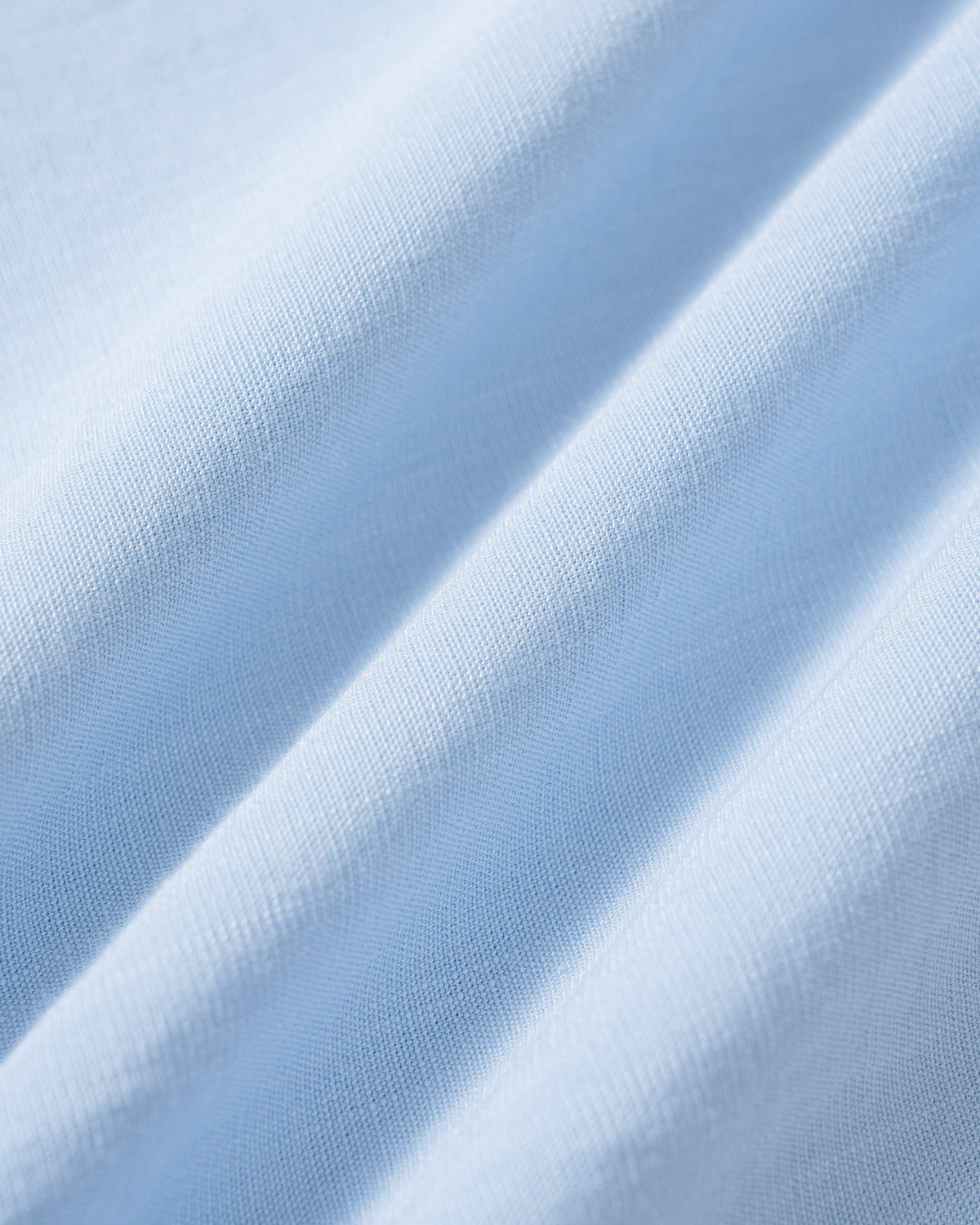 Pantalones rectos de color azul sólido con bolsillos